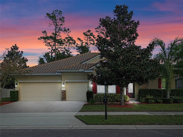 view of front of property with a garage