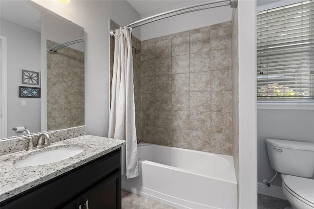 full bathroom with shower / bath combination with curtain, vanity, toilet, and tile patterned floors