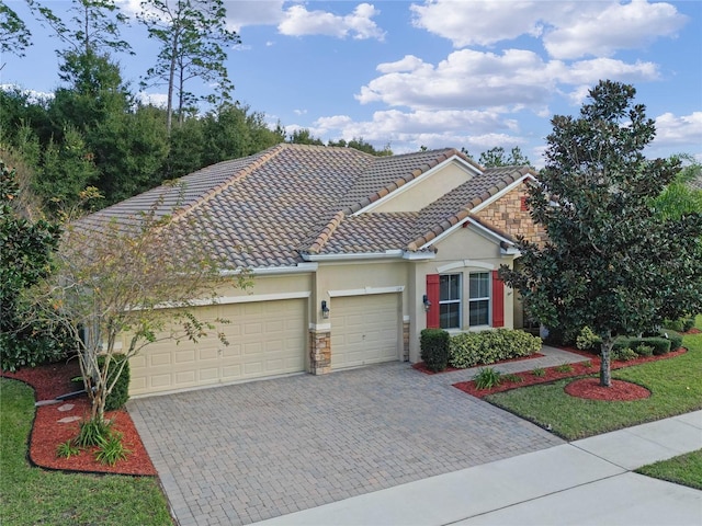 view of front of home with a garage