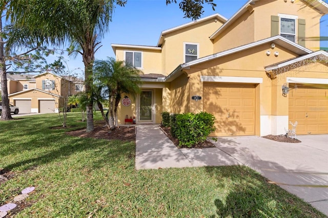 front facade featuring a front yard and a garage