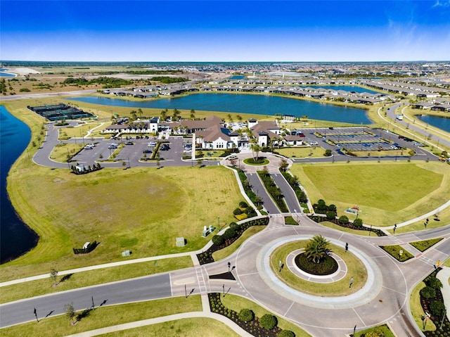 aerial view featuring a residential view and a water view