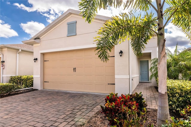 view of front of property featuring a garage