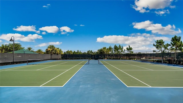 view of tennis court with basketball court