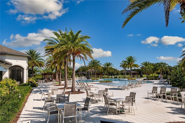 view of swimming pool with a patio area