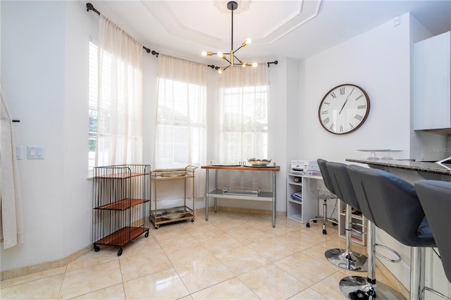 11410 Rapallo Ln, Windermere, FL 34786 - tiled office space with a chandelier and a tray ceiling