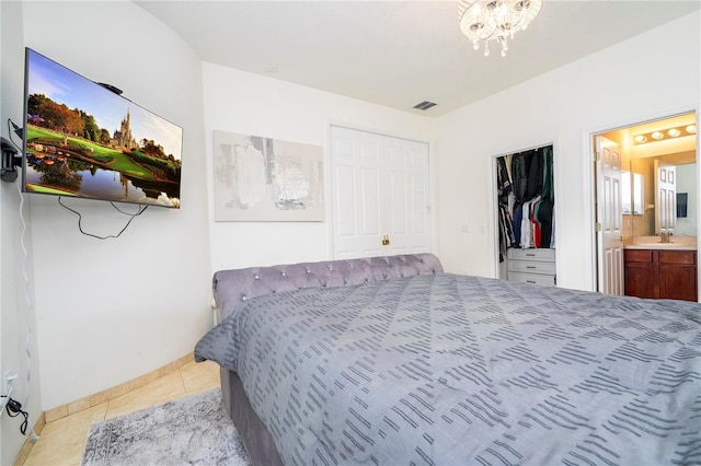 11410 Rapallo Ln, Windermere, FL 34786 - tiled bedroom featuring a closet and ensuite bathroom