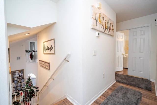 11410 Rapallo Ln, Windermere, FL 34786 - corridor featuring wood finished floors and an upstairs landing