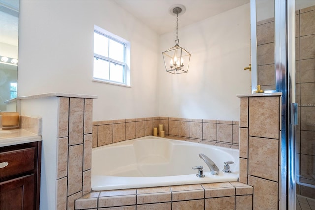 11410 Rapallo Ln, Windermere, FL 34786 - full bathroom with vanity, a bath, and a chandelier