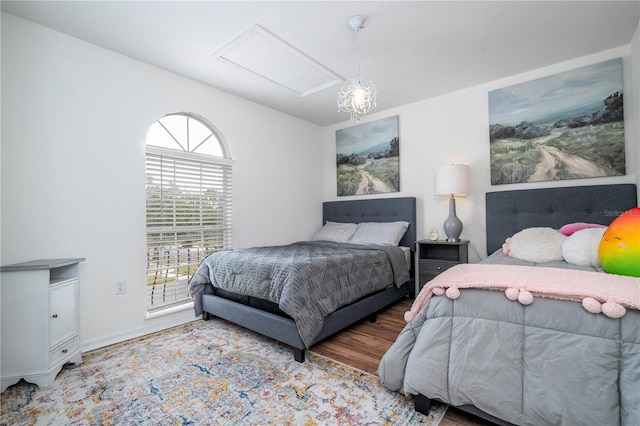 bedroom featuring wood-type flooring