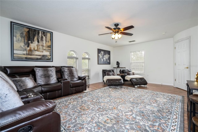 11410 Rapallo Ln, Windermere, FL 34786 - living area with plenty of natural light, ceiling fan, and wood finished floors