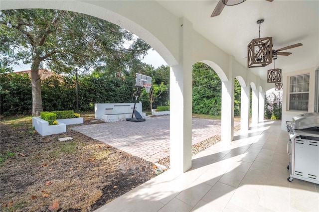 view of patio with ceiling fan