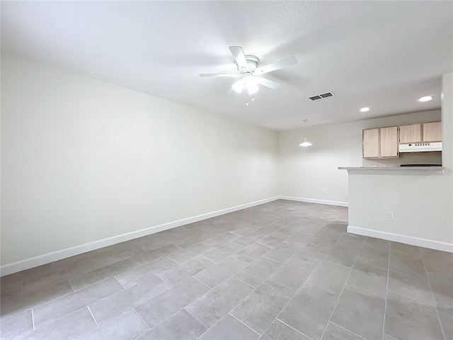 spare room featuring ceiling fan