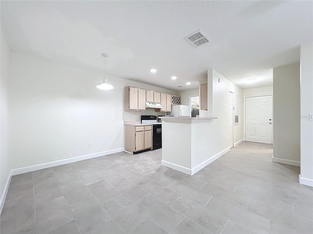 kitchen with kitchen peninsula, light brown cabinetry, range with electric cooktop, pendant lighting, and white fridge