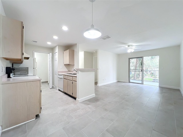 kitchen featuring ceiling fan, dishwasher, light brown cabinets, kitchen peninsula, and decorative light fixtures