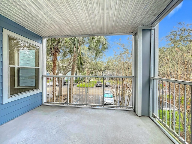 unfurnished sunroom featuring a healthy amount of sunlight