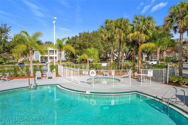 view of swimming pool featuring a patio