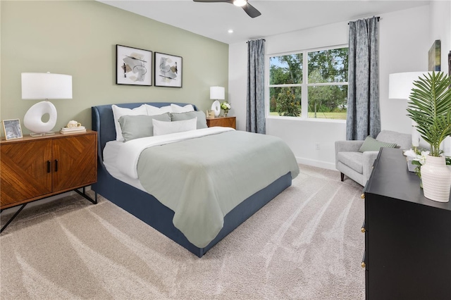 carpeted bedroom with ceiling fan