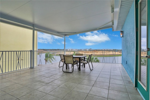 view of patio with a water view