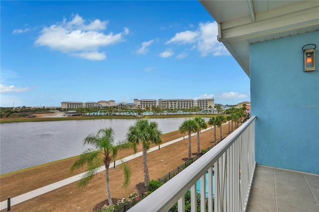 balcony featuring a water view