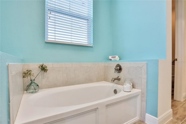 bathroom with a tub