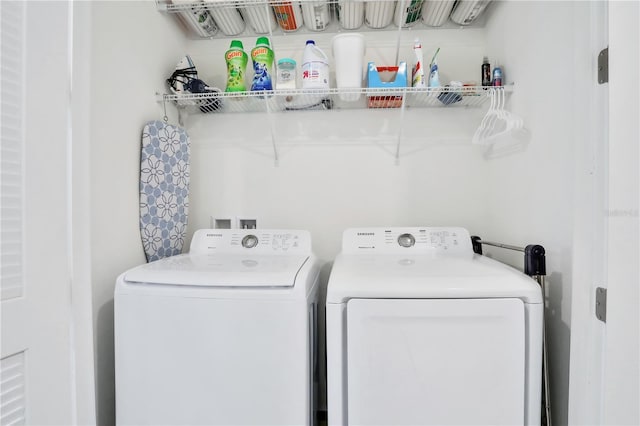 laundry room featuring independent washer and dryer