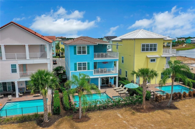 rear view of property featuring a patio