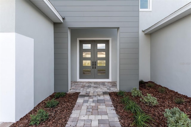 property entrance featuring french doors