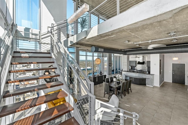 interior space featuring a towering ceiling