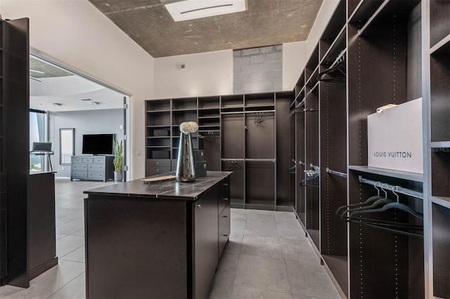 walk in closet featuring light tile patterned floors