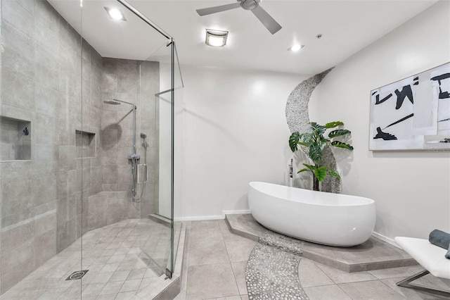 bathroom featuring tile patterned floors, ceiling fan, and independent shower and bath