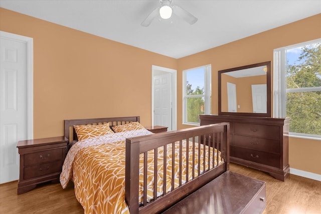 bedroom featuring ceiling fan and wood-type flooring