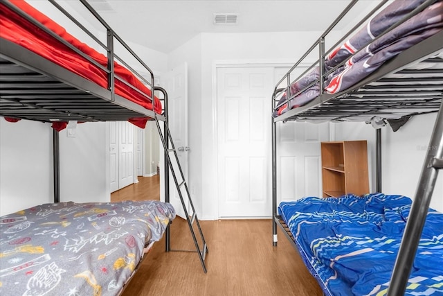 bedroom featuring hardwood / wood-style flooring