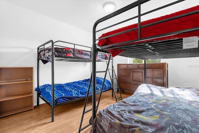 bedroom featuring hardwood / wood-style floors