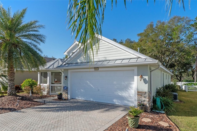 view of front of home with a garage