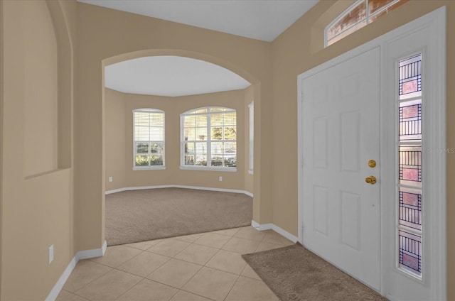 entrance foyer featuring light tile patterned floors