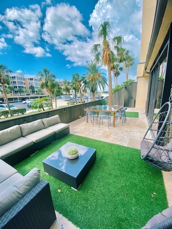 view of yard featuring an outdoor living space and a patio area