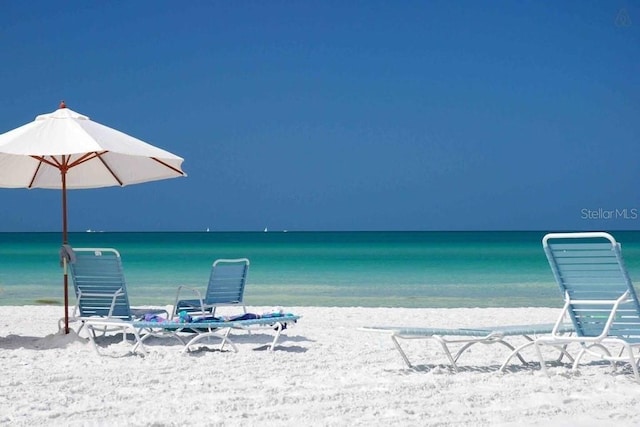 water view featuring a beach view