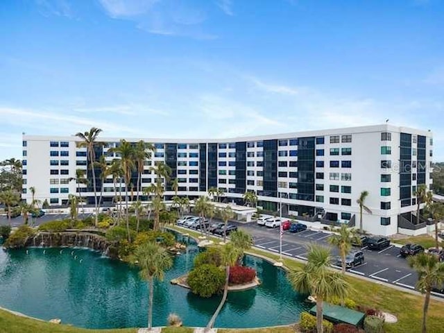5855 Midnight Pass Rd Unit 108, Sarasota, FL 34242 - view of apartment building / complex featuring a water view