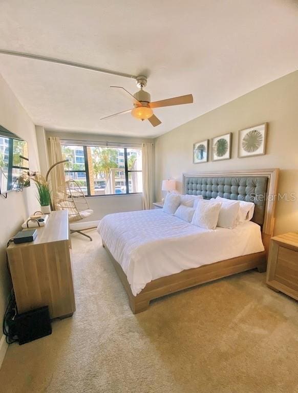 5855 Midnight Pass Rd Unit 108, Sarasota, FL 34242 - bedroom with carpet floors and ceiling fan