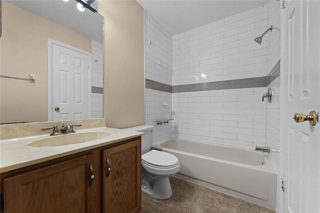 full bathroom featuring vanity, toilet, and tiled shower / bath