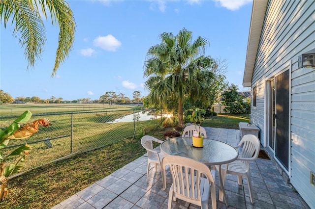 view of patio / terrace with a rural view