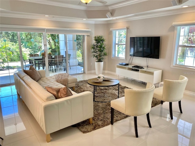 living room featuring light tile patterned floors, ceiling fan, and crown molding