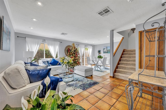 tiled living room featuring crown molding and a textured ceiling