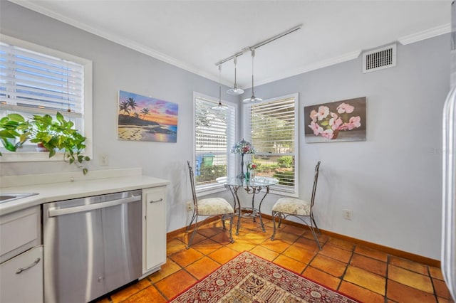 kitchen with white cabinets, dishwasher, decorative light fixtures, and track lighting