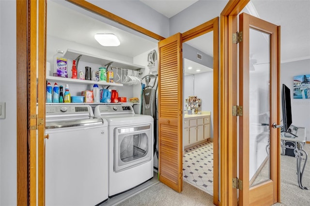 laundry area featuring separate washer and dryer