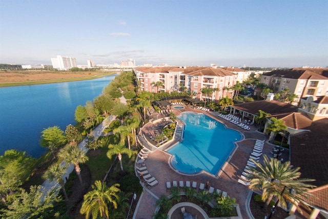 view of pool with a water view