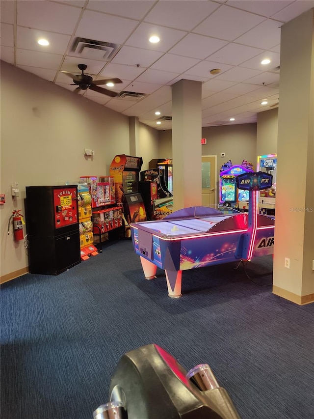 recreation room featuring carpet floors and ceiling fan