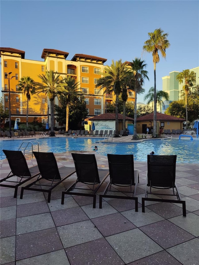 view of pool featuring a patio area