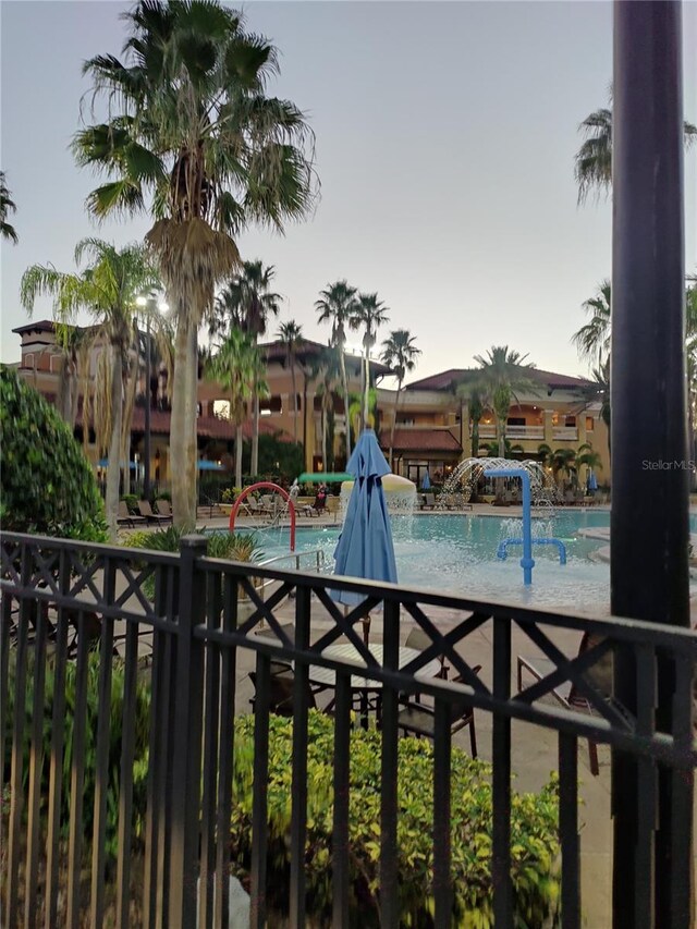 view of pool with pool water feature