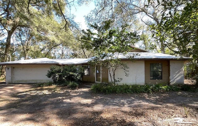 ranch-style house with a garage